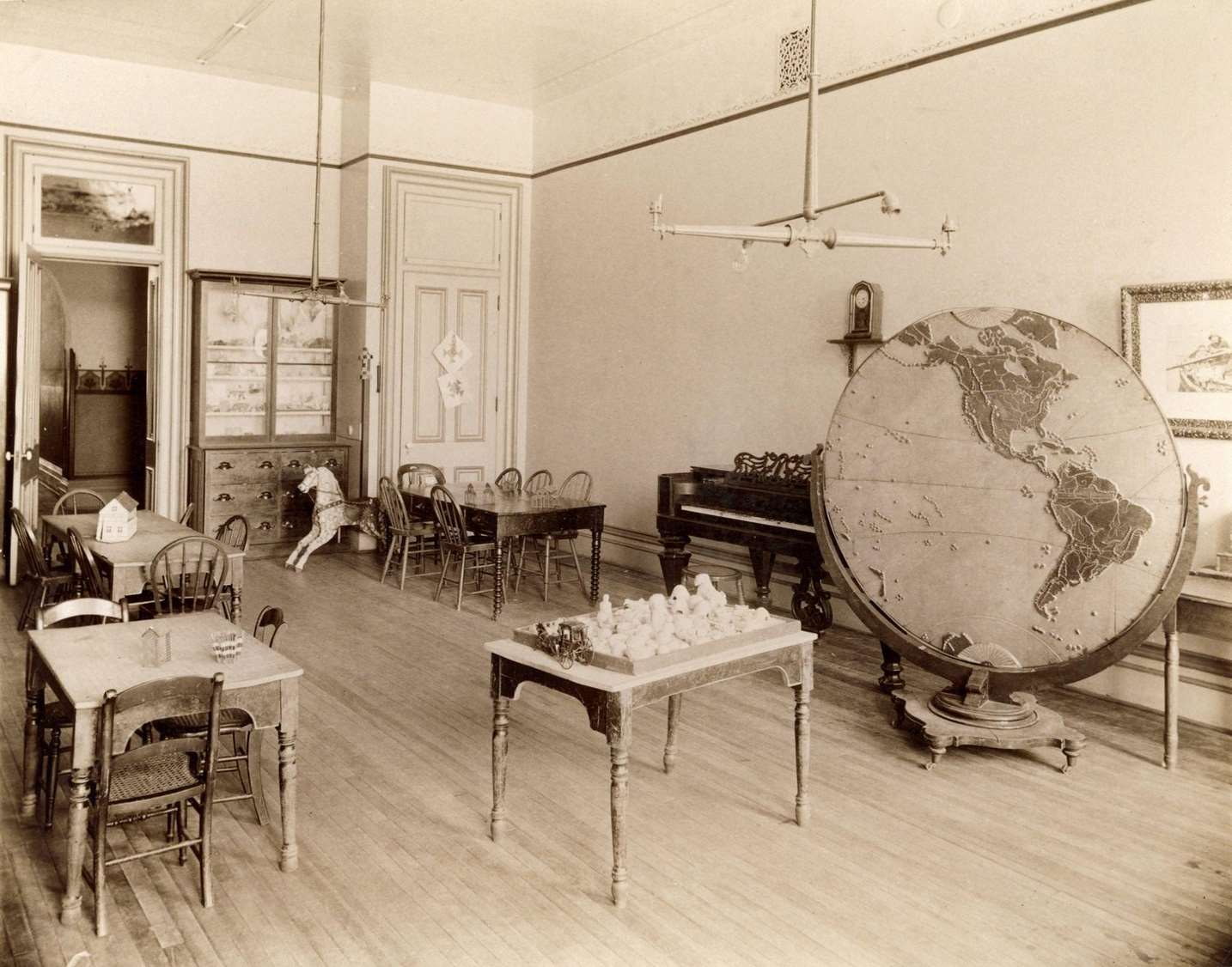 Interior of the State School for the Blind, perhaps a study or room for recreation, Janesville, Wisconsin, 1893.
