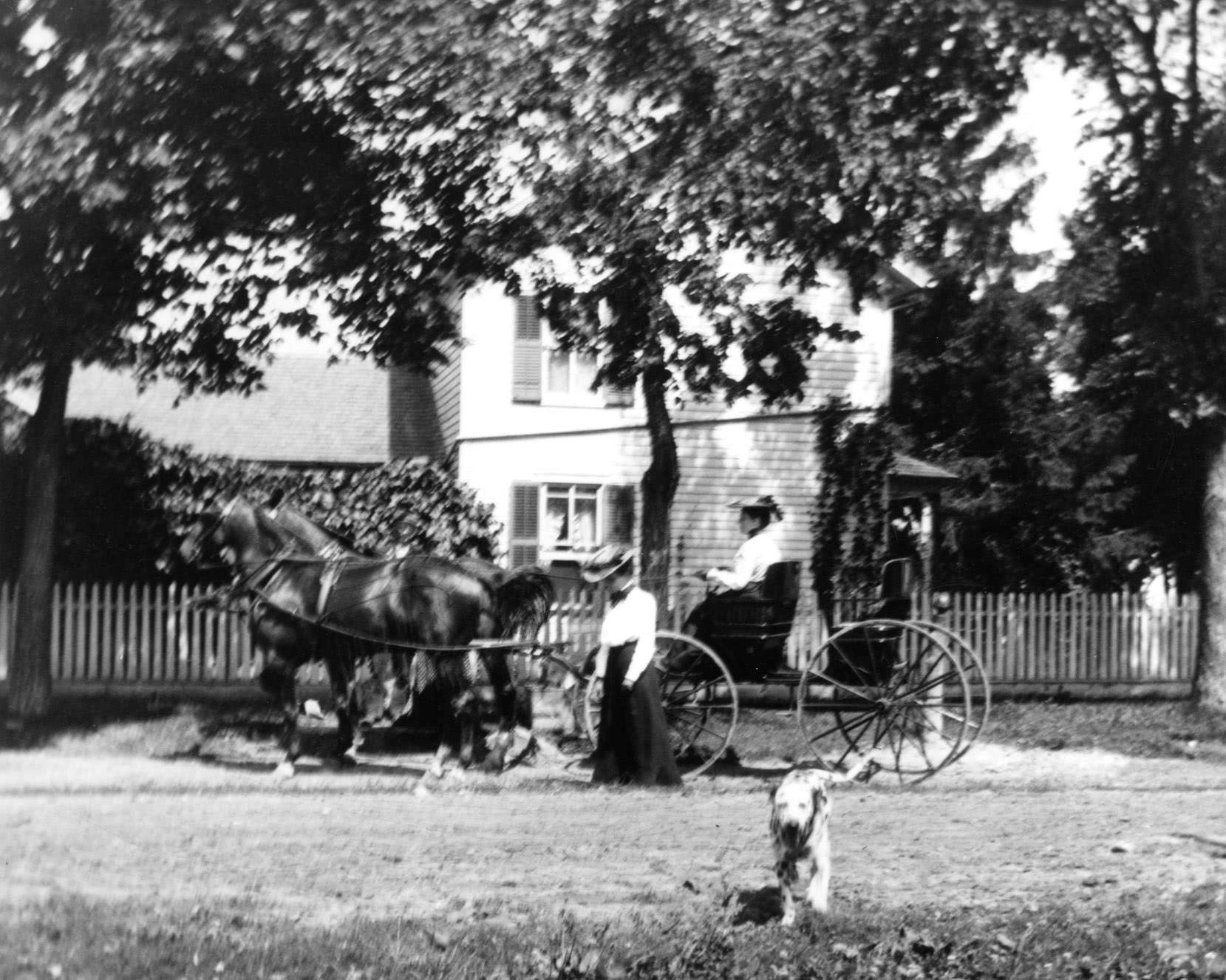 Kate and Ellen Nelson on Park Avenue with an older couple, 1890