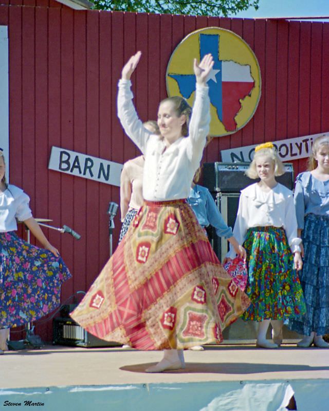 A local dance group performs at a festival in Bear Creek park, Keller, 1995