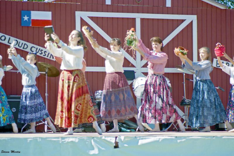 A local dance group performs at a festival in Bear Creek park, Keller, 1995