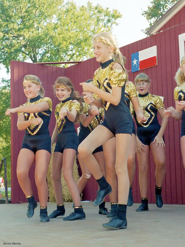 A group of young girls perform during a festival in Keller, Texas in 1995