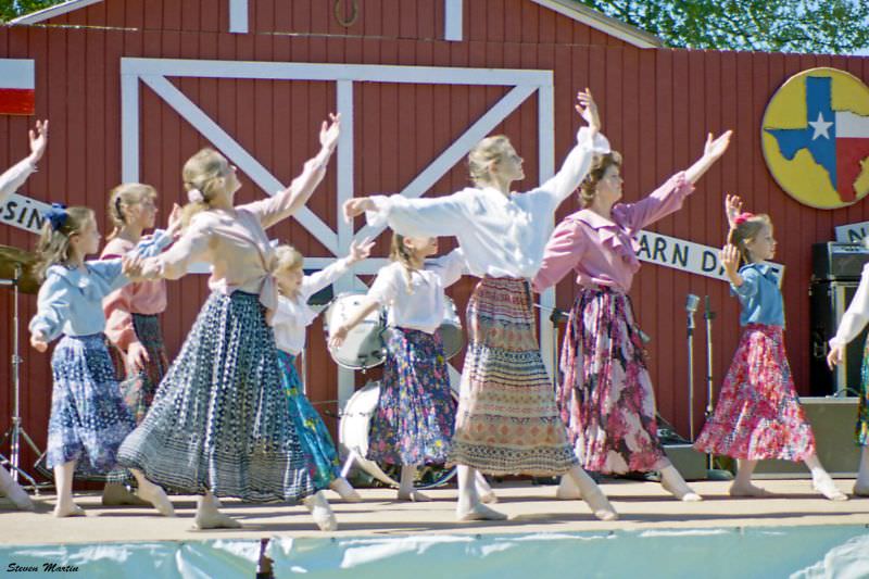 A local dance group performs at a festival in Bear Creek park, Keller, 1995