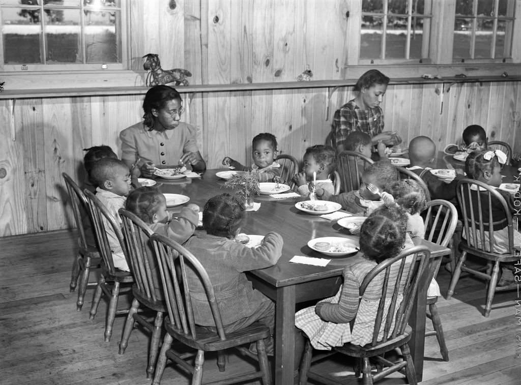 Children of Agricultural Workers in Day Nursery eating Lunch, Okeechobee Migratory Labor Camp, Belle Glade, Florida, February 1941