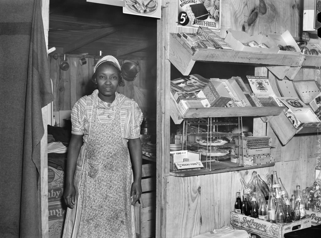 Woman working in New Cafe opposite entrance to Camp Livingston U.S. Military Base, Alexandria, Louisiana, December 1940