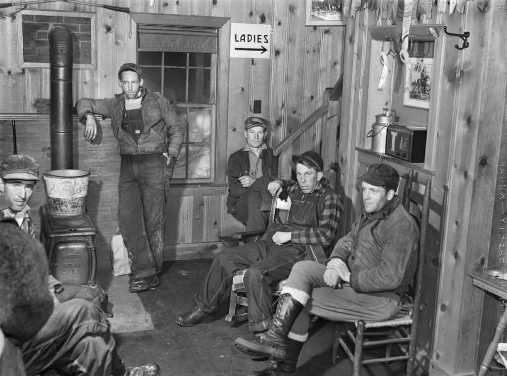 Hired help resting after day's work on Upwey horse farm, South Woodstock, Vermont, March 1940