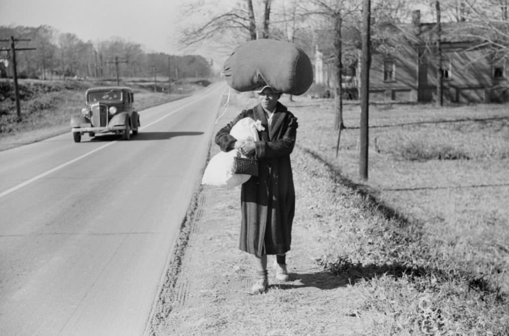 Woman Carrying Laundry Home Along Highway, Near Durham, North Carolina, November 1939