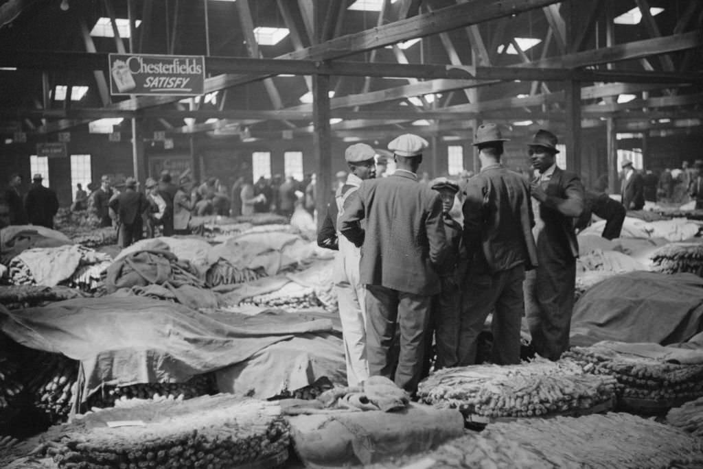 Farmers Waiting for Tobacco to be Sold at Auction in Warehouse, Durham, North Carolina, November 1939