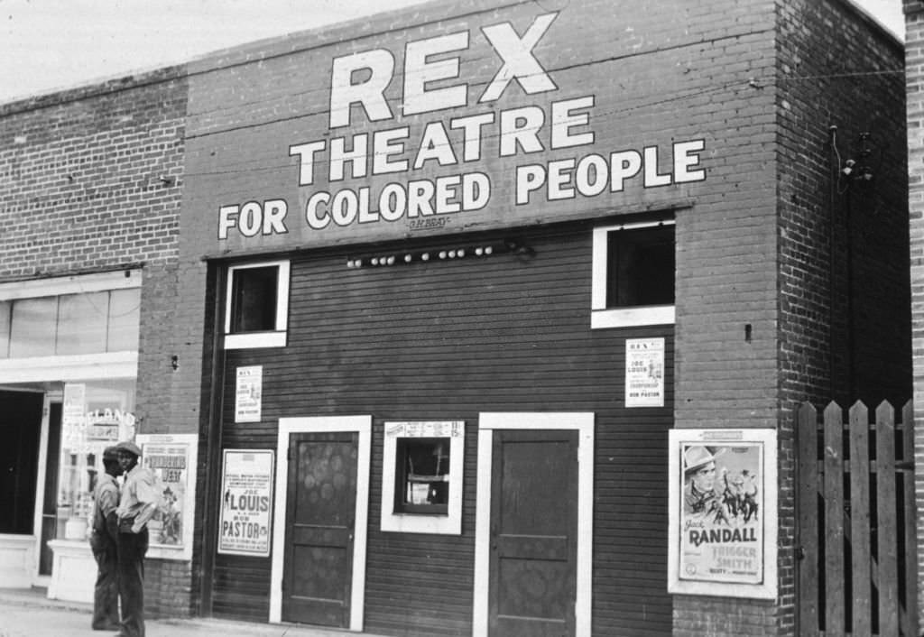The Rex Theatre in Leland, Mississippi, which is segregated under the Jim Crow laws, November 1939