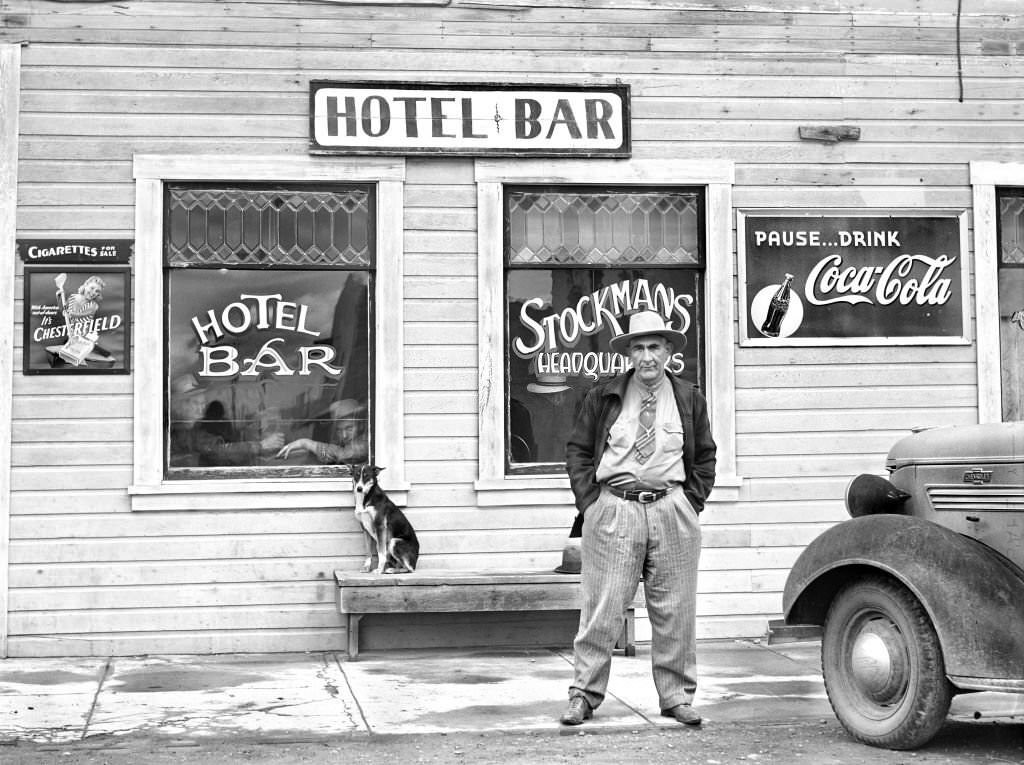 Man standing in front of Hotel Bar, Big Piney, Wyoming, September 1941