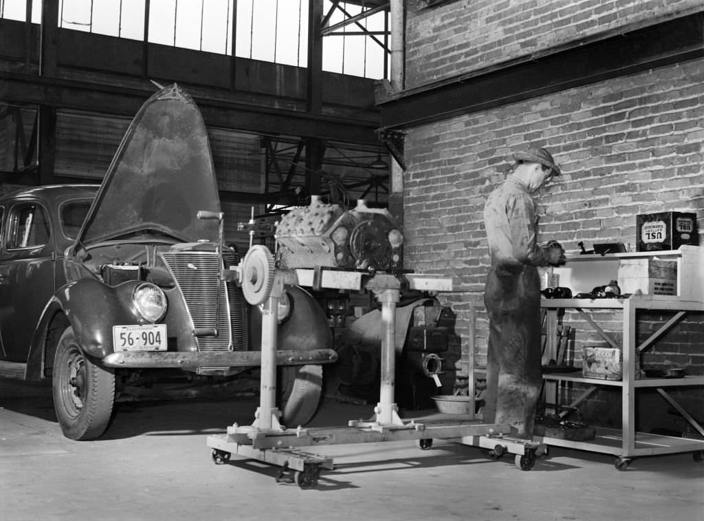 Mechanic repairing Automobile Motor, Atlanta, Georgia, 1939