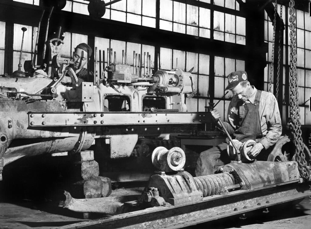 Mechanics repairing Tractor, Atlanta, Georgia, 1939