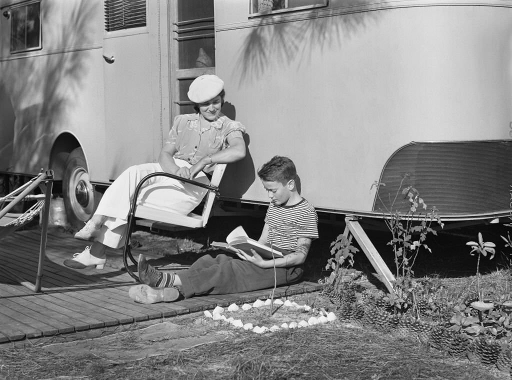 Mother listening to son read. Sarasota trailer park, Sarasota, Florida, January, 1941