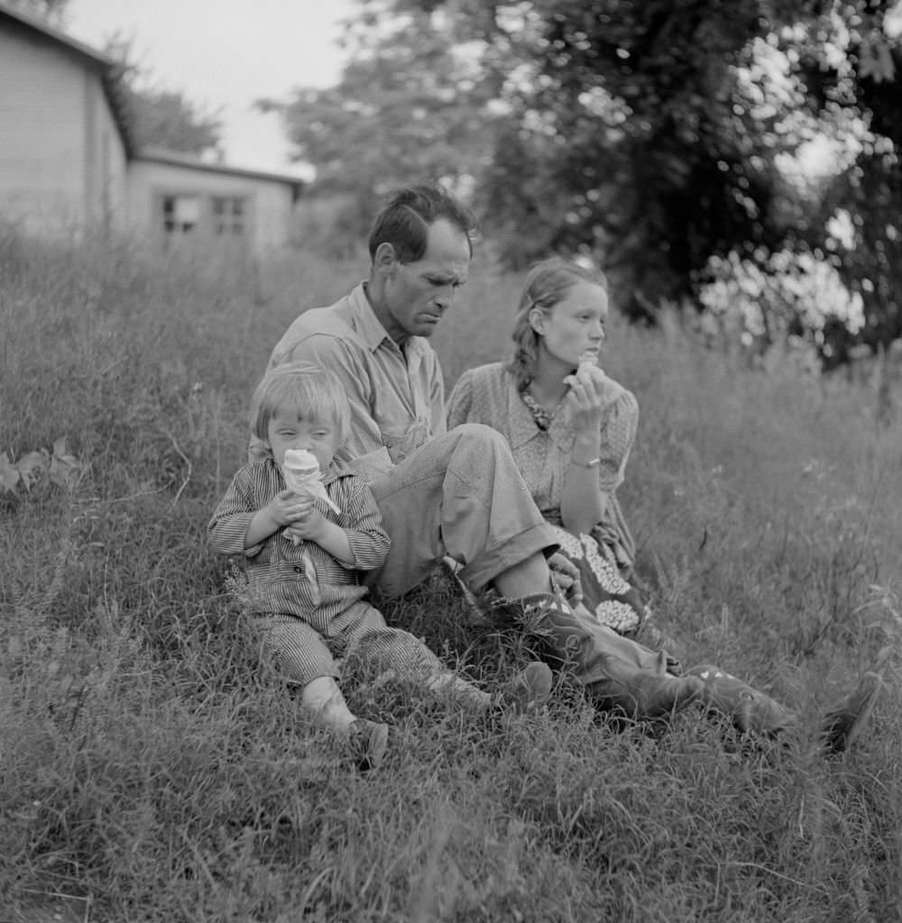 Farm Family Eating Ice Cream along Cane River on Fourth of July, near Natchitoches, Louisiana, July 1940