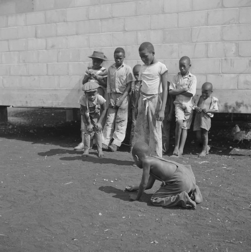 Children Playing Marbles, Okeechobee Migratory Labor Camp, Belle Glade, Florida, June 1940