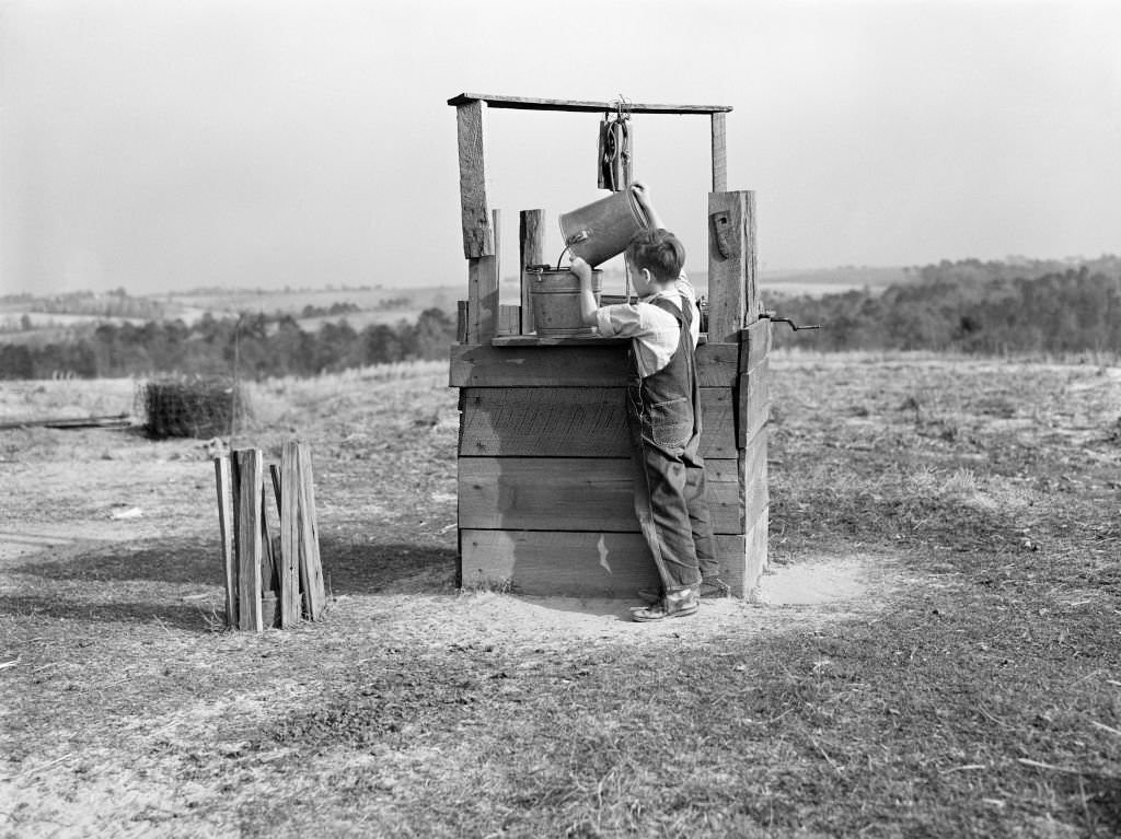 Young Boy getting Water from Old Well, Coffee County, Alabama, 1939