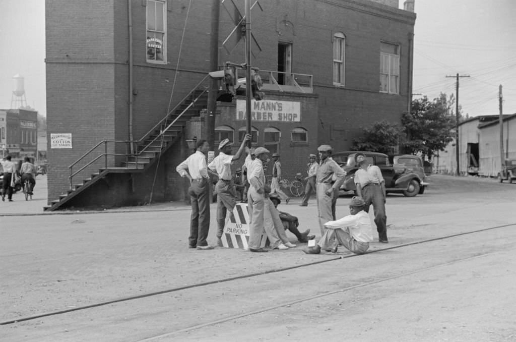 Group of Men Hanging out Near Railroad Tracks in Center of Town, Fitzgerald, Georgia, 1939