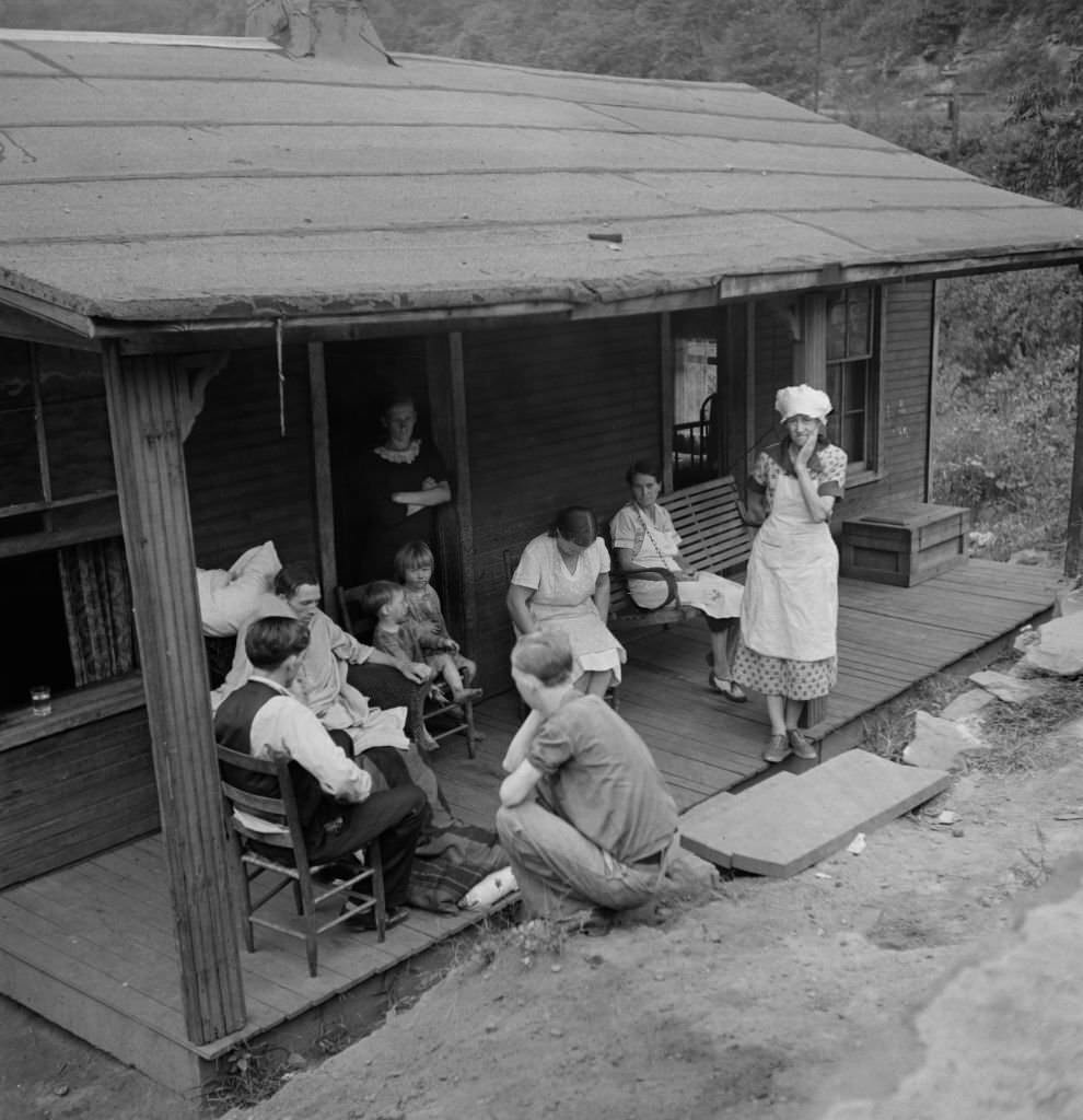 Family of Man Dying of Tuberculosis Gathering on Front Porch of Home, Marine, West Virginia, 1939