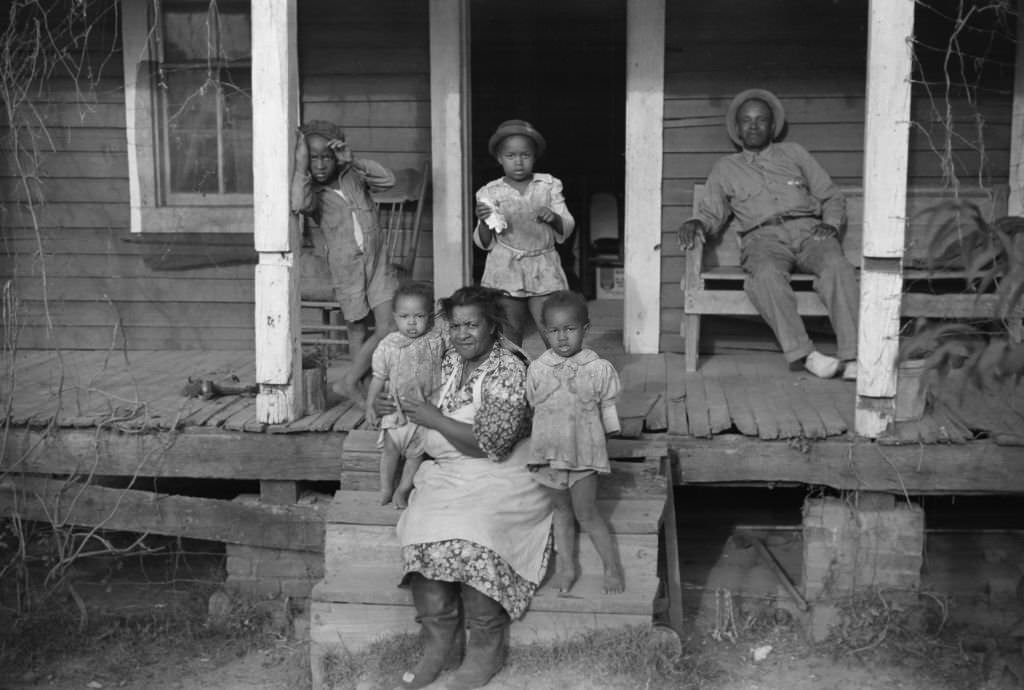 Tenant Farmer and Family on Porch, Marcella Plantation, Mileston, Mississippi, October 1939