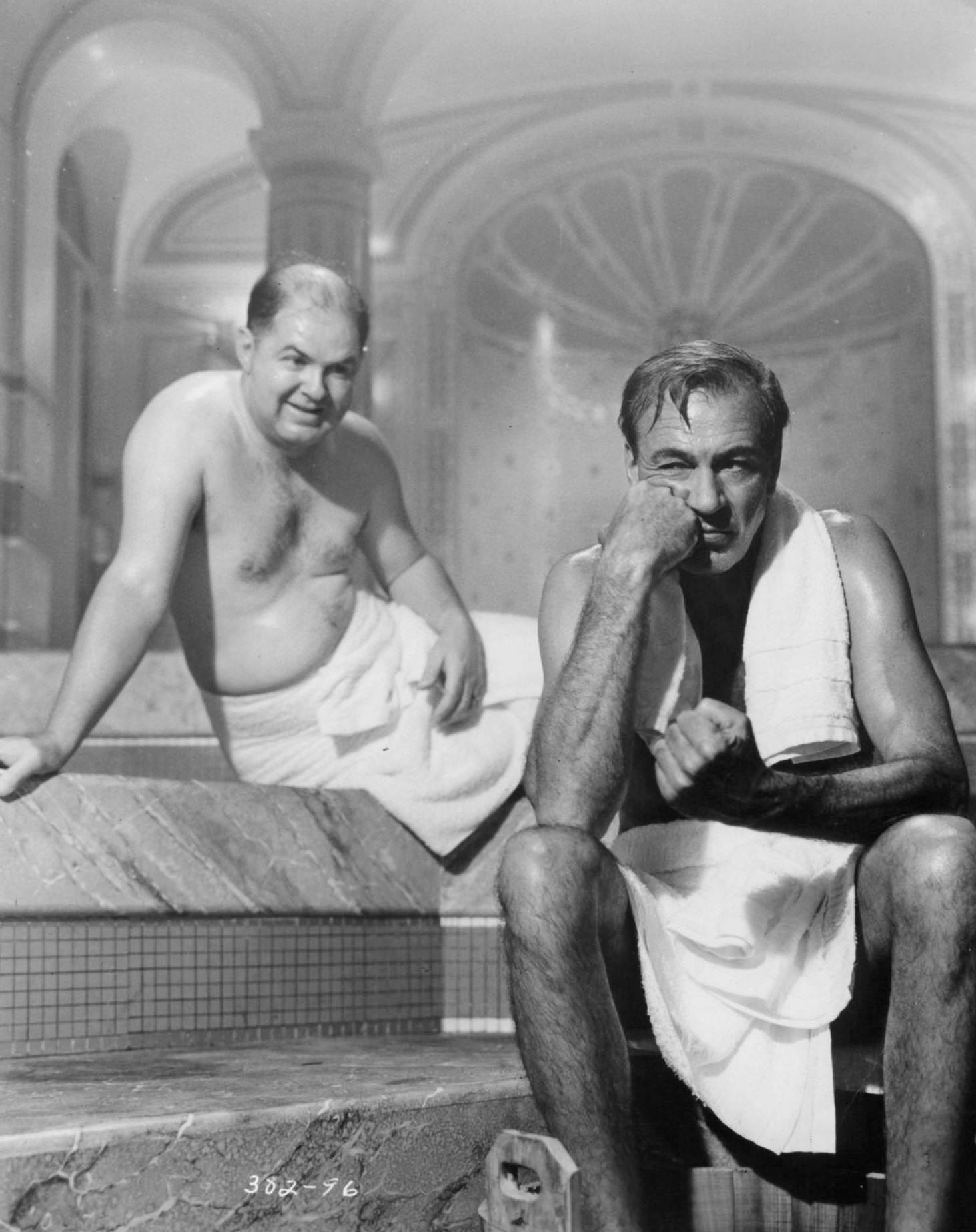 John McGiver and Gary Cooper in steam room in a scene from the film 'Love In The Afternoon', 1957.