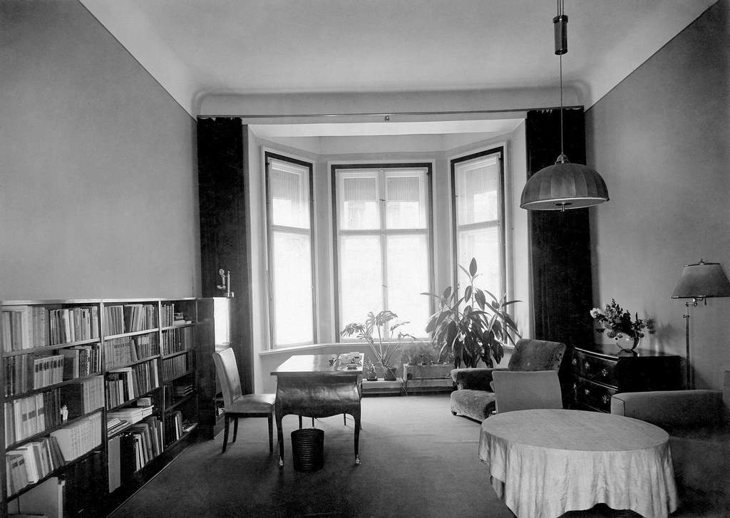 Modern living room with simple furniture and book shelves,1931