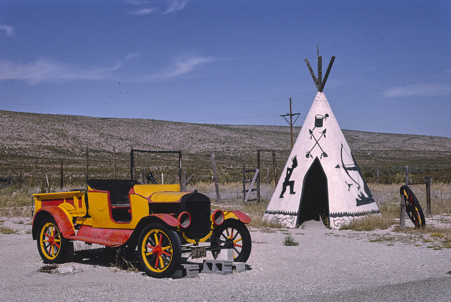 Apache Canyon Trading Post, teepee and car, Routes 62 and 180, Whites City, New Mexico, 1993