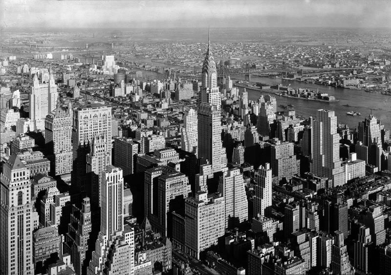View from Empire State Building to Chrysler Building, and Queensboro Bridge, New York City, low viewpoint, January 1932