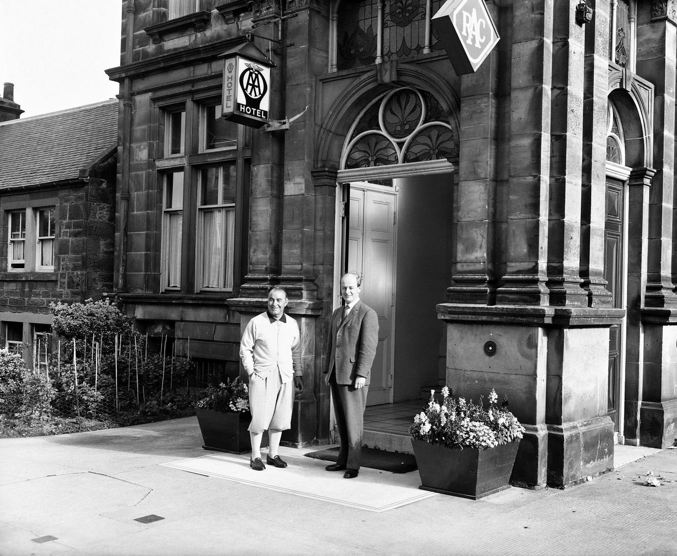 Gene Sarazen of the USA beside the entrance to the Russacks Hotel during the Open Championship on the Old Course at St Andrews on July 7, 1964 in St Andrews, Scotland.