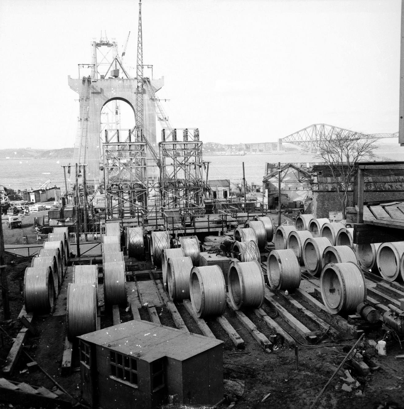 Reels of quarter-inch wire are drawn from here to the cable anchorage at the other end of the Forth Road Bridge, 1962