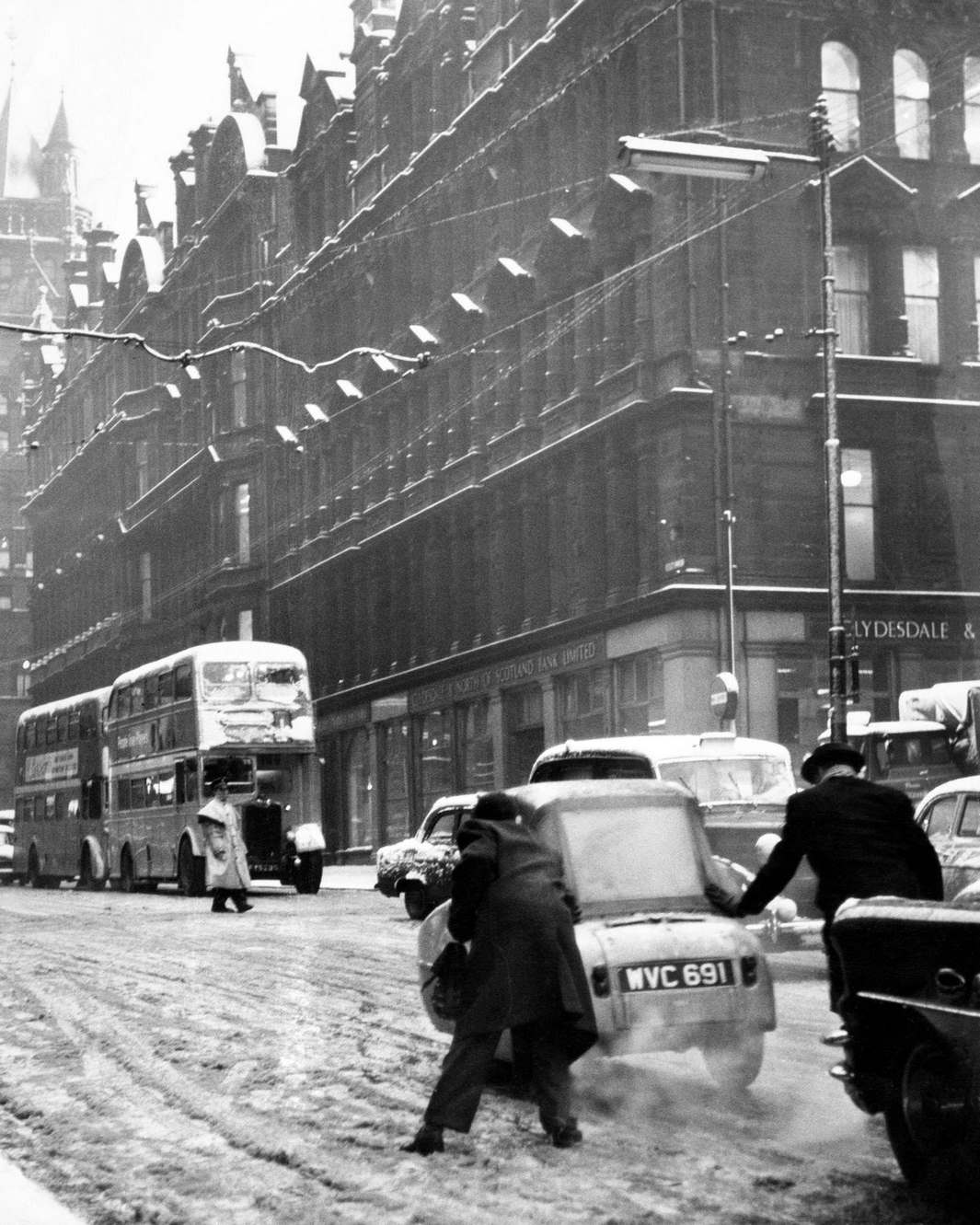 Chaotic road conditions cause big traffic hold ups in the centre of Glasgow, 1961
