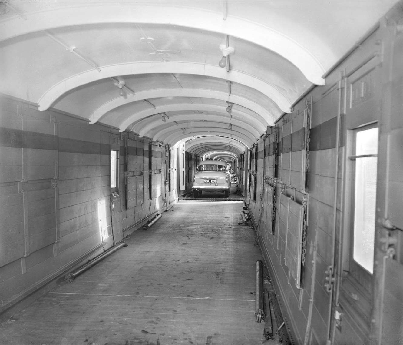 Inside view of the train which transported both passengers and their cars, so that people could go on holiday by train but still take their cars with them, 1960