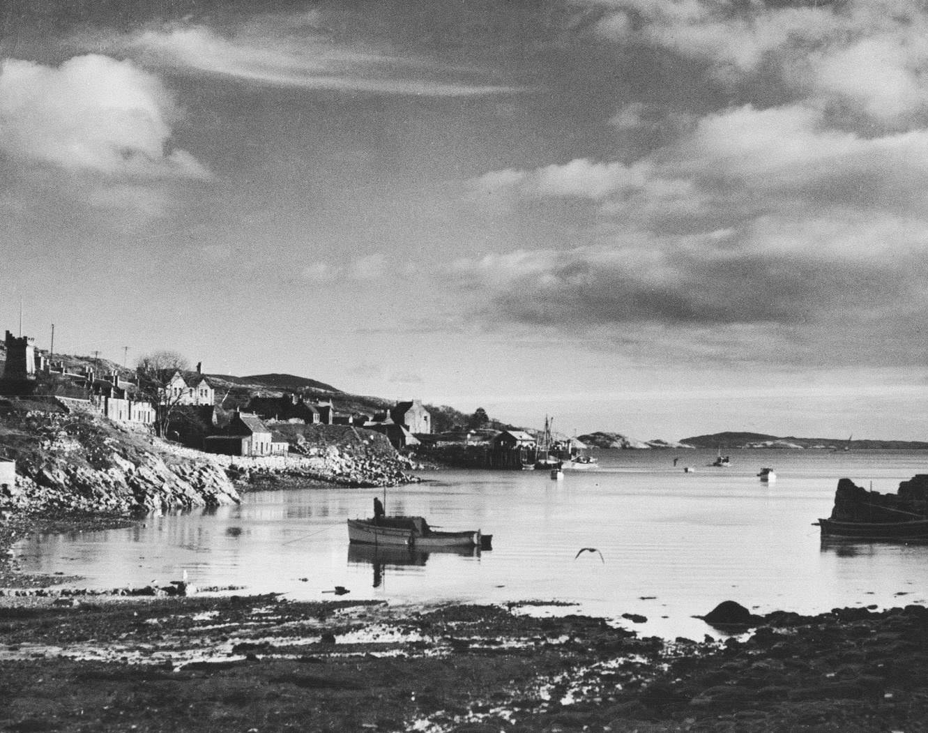 Harbour scene in the Hebrides, Scotland, 1960.