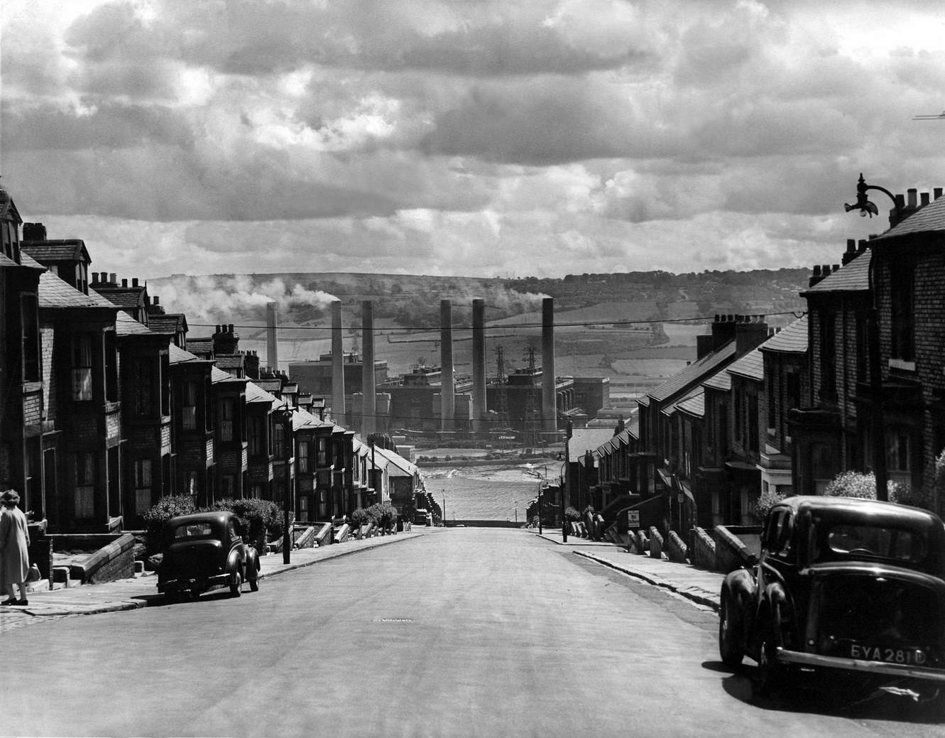 Dunston Power Station's six chimneys rise into the air with rolling fields behind them – on the spot where the MetroCentre now stands in Gateshead, 1960s