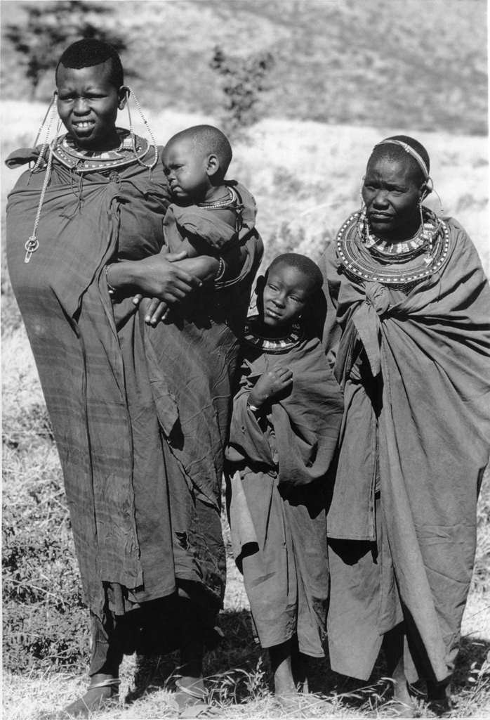 A small group of Masai women and children standing near Ngorongoro Crater, Tanzania.