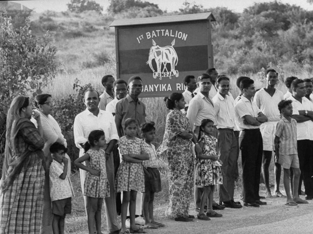 Local residents stand outside Colito Barracks, where mutineers are imprisoned, in Dar es Salaam, 1960s