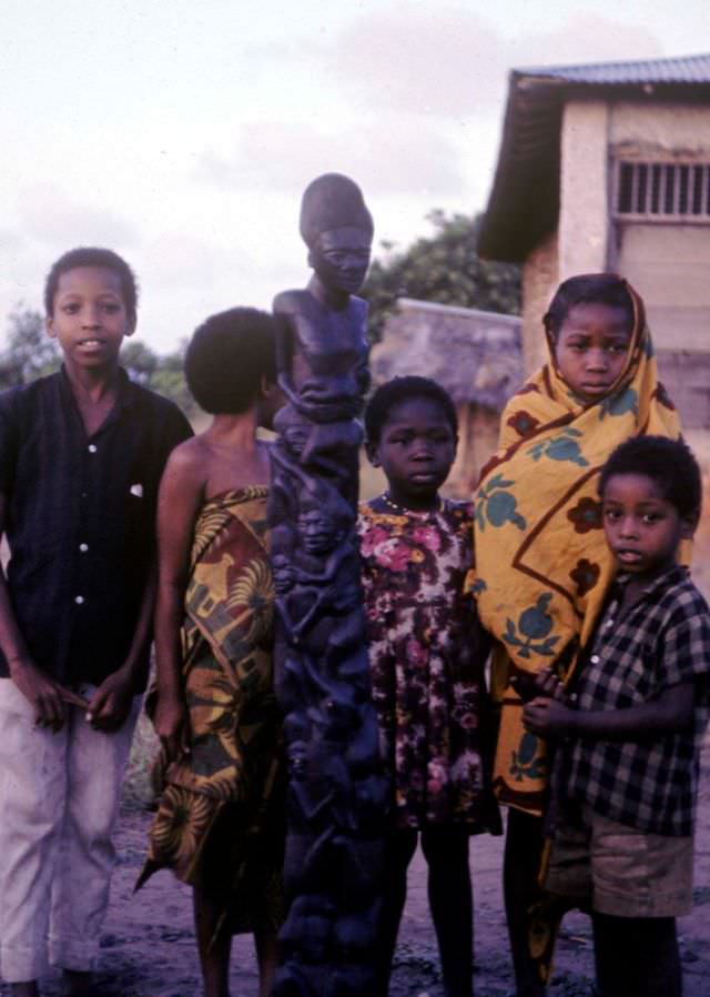 Kids with Makonde carving, 1969