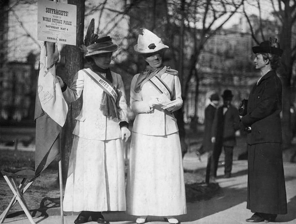 Mrs John Rogers and Mrs Leonard Hand (right) enroll new recruits for a Woman Suffrage Parade, 1913