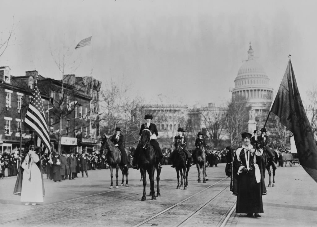 Texan suffragette Jane Walker Burleson (1888 - 1957), Grand Marshal of the parade, on horseback leading suffrage march on Pennsylvania Avenue, Washington DC, US, 3rd March 1913.