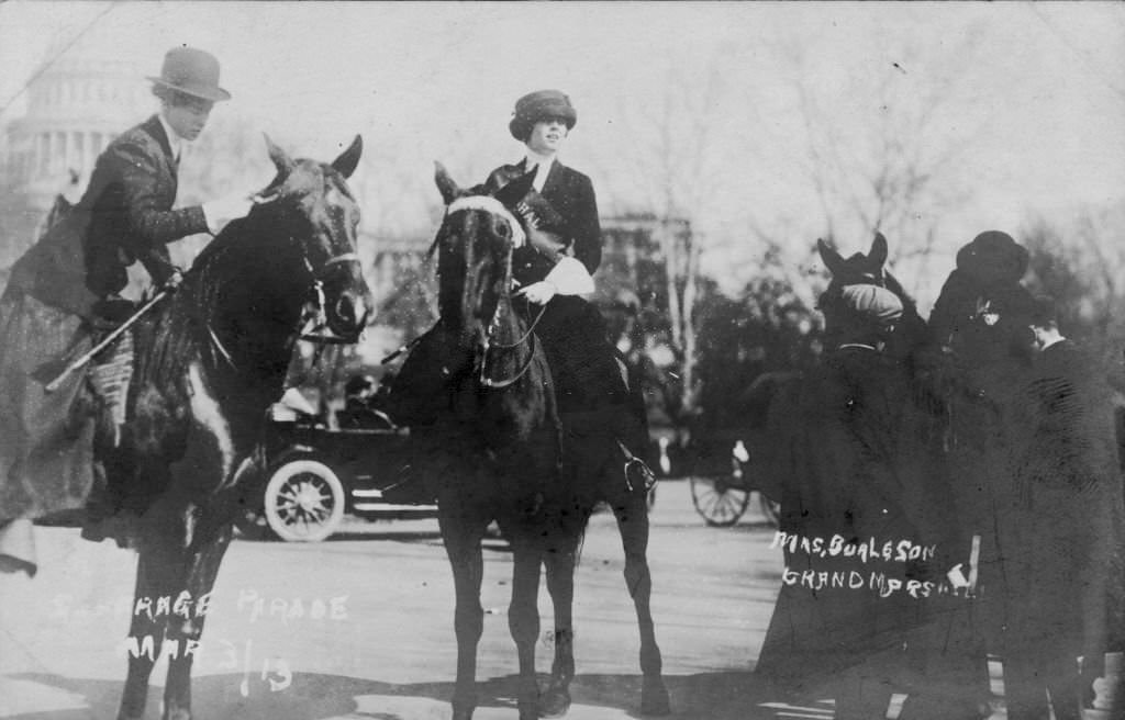 Suffragist, socialite, and artist May Jane Walker Burleson, aka "Jennie" May Burleson, center, mounted on her horse while acting as Grand Marshall for the 1913 Washington, DC suffrage parade