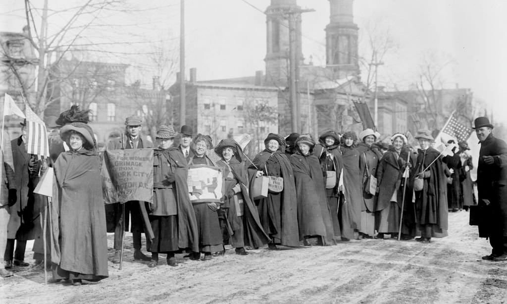 American suffragists Rosalie Jones and Ida Carft lead a march, 1913.