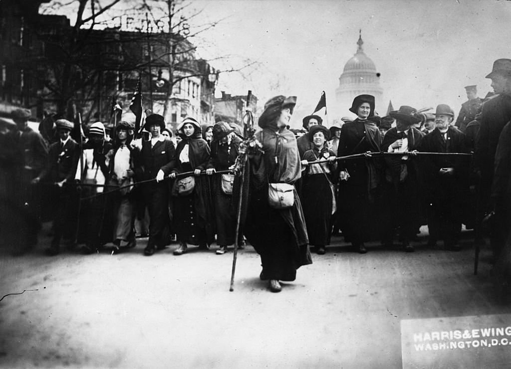American suffragette Rosalie Jones leading a crowd of protesters up Pennsylvania Avenue, Washington DC, after a march from New York.