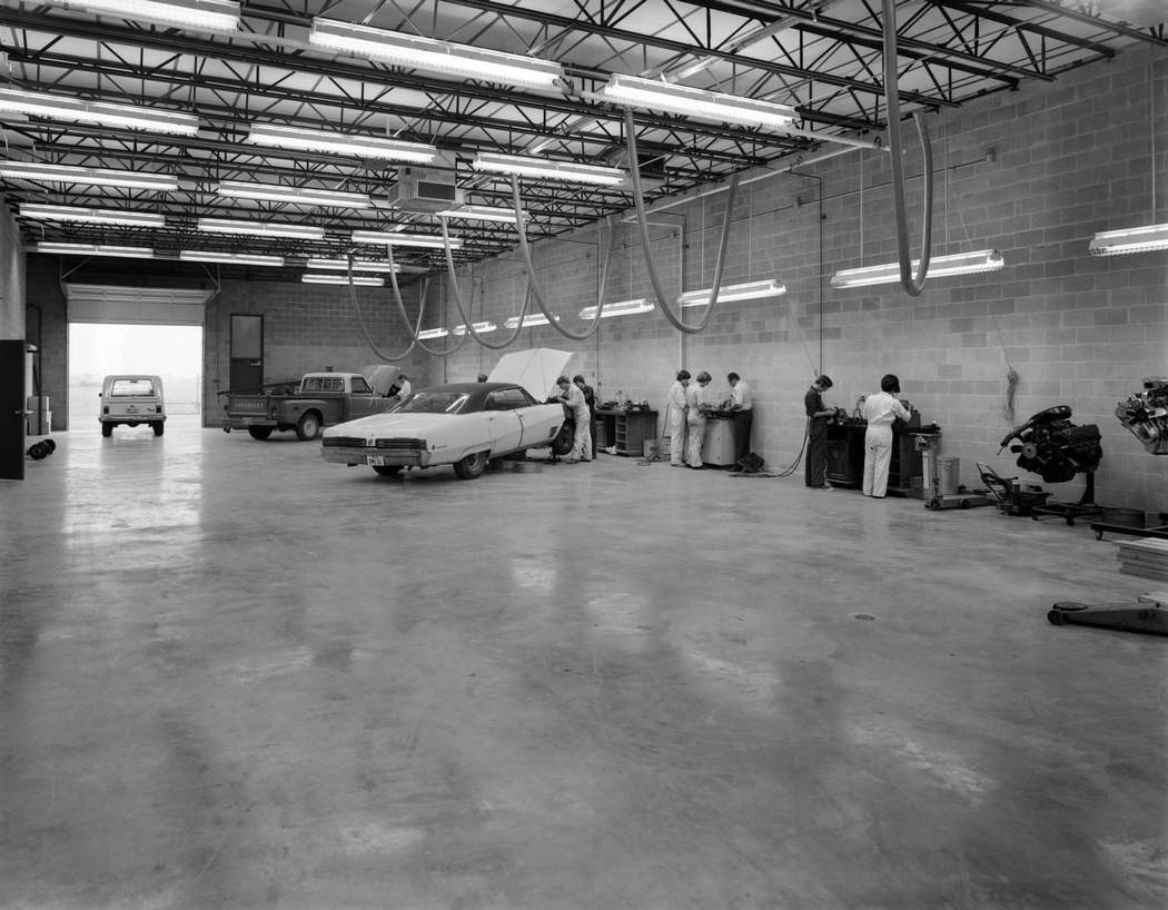 Mechanics Working in a Garage, 1975