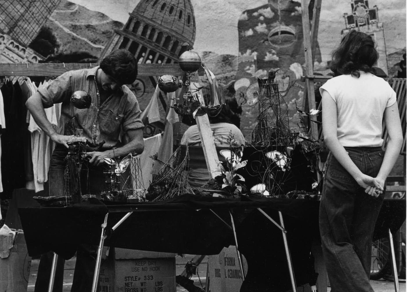 Metalsmith sculptor selling wares at the Renaissance Market, 1977