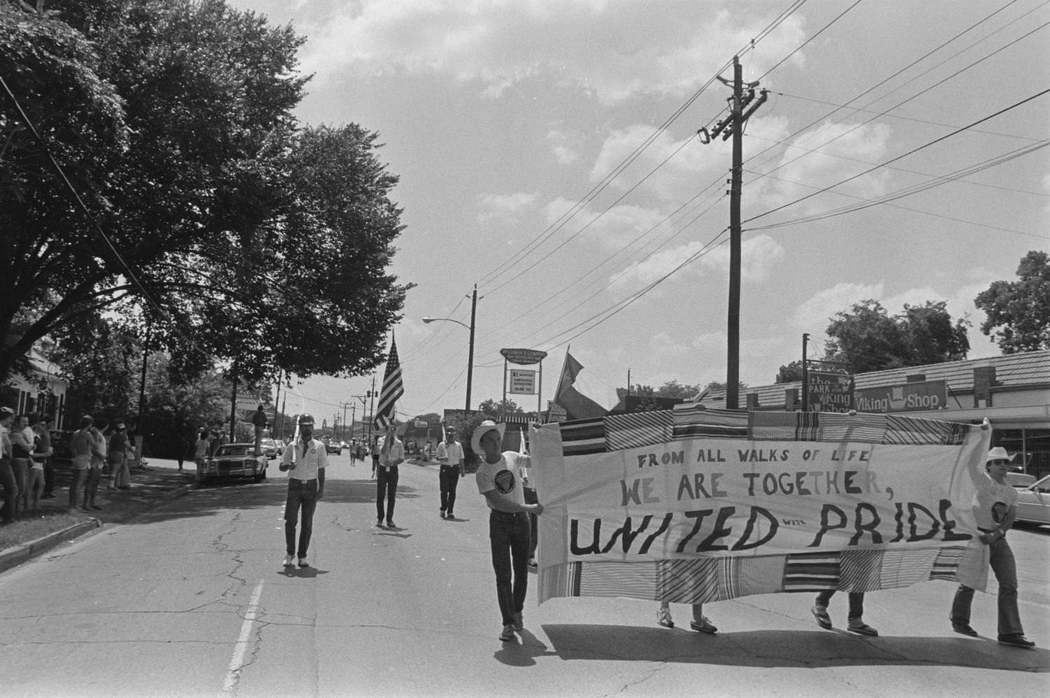 People Walking With Banner in Parade, 1979.