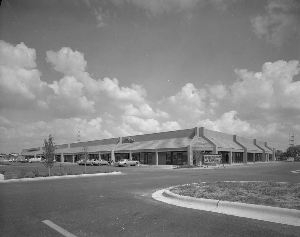 The South Ridge Plaza strip mall with Spanish tile along the roof line, 1979