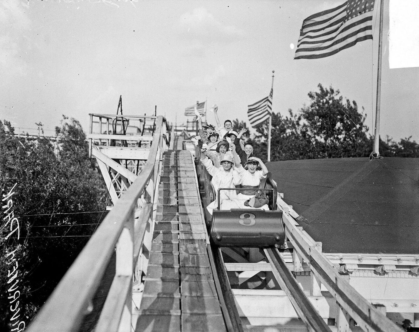 Parkgoers riding the Bob #3 roller coaster at Riverview Park, Chicago, Illinois, June 12, 1915.