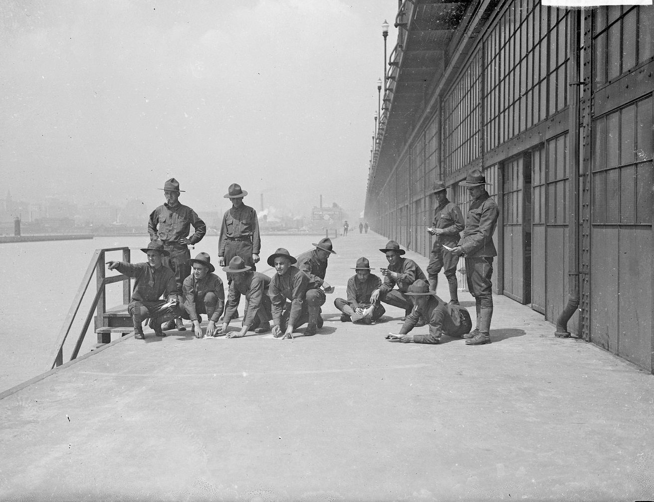 US Army, 3rd Reserve Engineers, gathering on the cement outside the building at the Municipal Pier (Navy Pier), Chicago, Illinois, 1910s.
