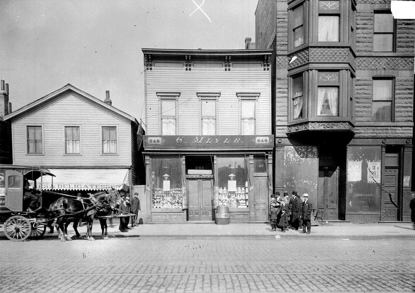 Exterior view of Cerf Meyer's saloon at 848 Blue Island Avenue in Chicago, 1911.