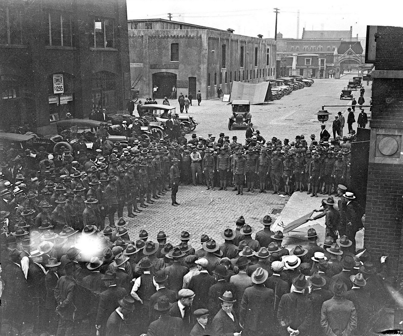 Soldiers of Battery D of the Illinois National Guard, gathered at the stockyards on Exchange Avenue in the New City community area, Chicago, Illinois, June 30, 1916.