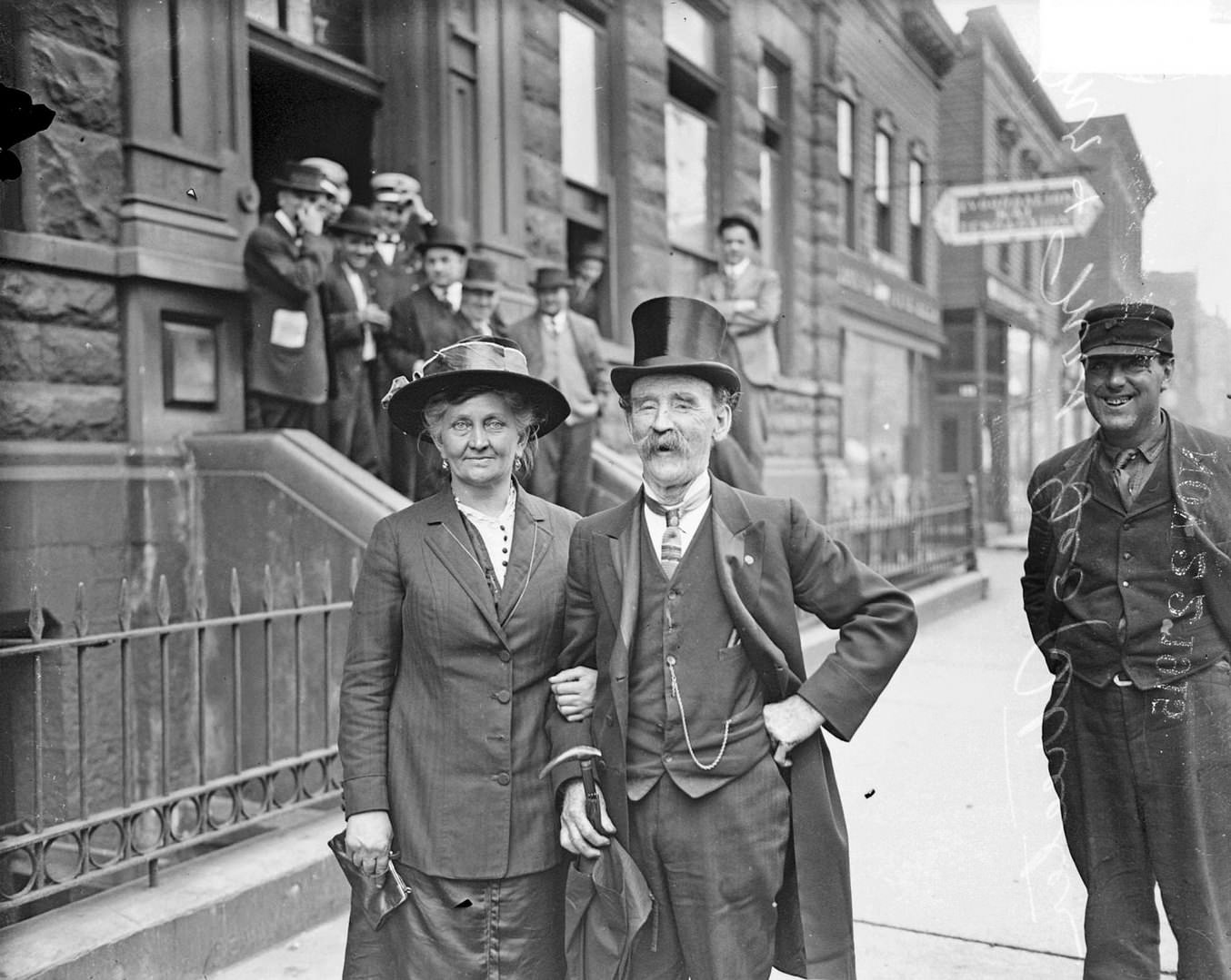 Captain George Wellington Streeter and his wife, Elma, standing on a sidewalk, Chicago, Illinois, October 13, 1915.