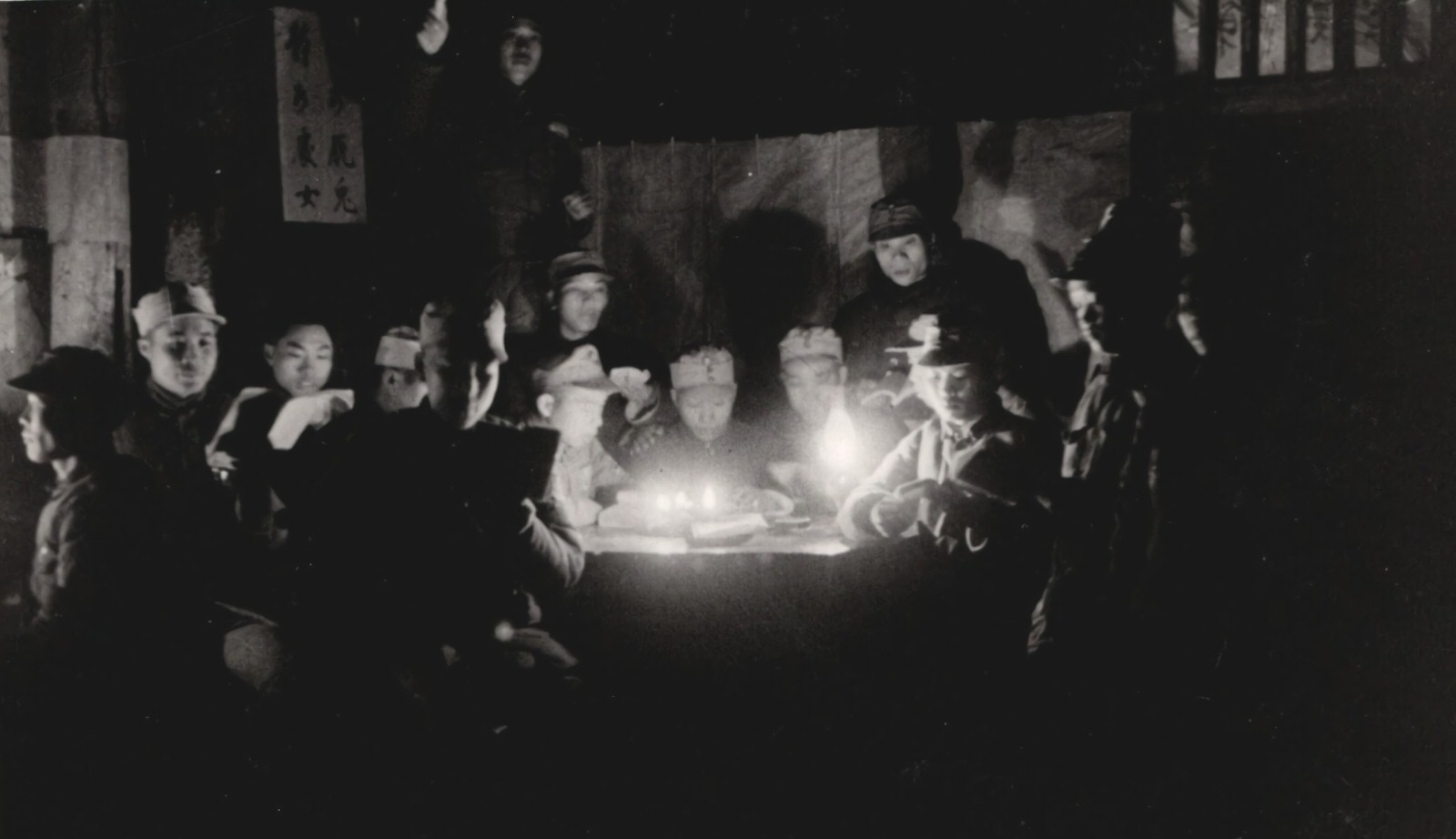 Meeting of Chinese officers around a night light. 1937-1940